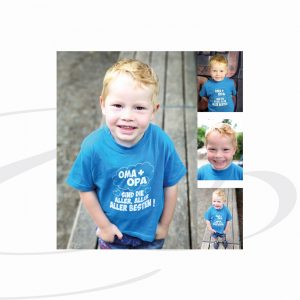 Junge hat seine Hände in der Hosentasche fotografiert im Kindergarten